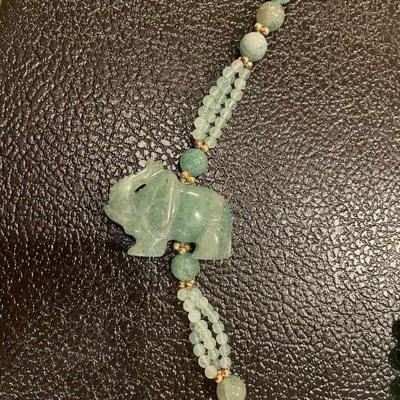 Jade elephant with gold balls